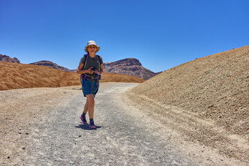 Hiker on volcanic trail