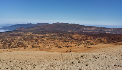 Fototapeta premium Caldera rim over lava fields