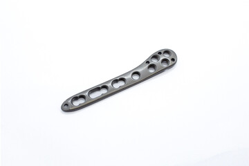 An Distal fibula Plate isolated on the white background. Olecranon plate is used to fix a fractured a ankle bone joint.