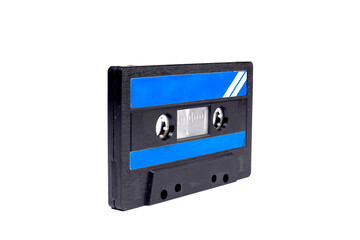 Black vintage audio cassette tape isolated on white background. Retro style background. Top view,...