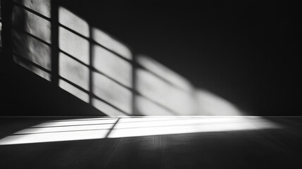 Window shadows on dark wall and floor in black and white style
