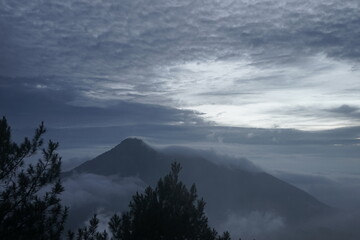 Misty Mountain Peaks at Dawn A Serene Landscape Photograph