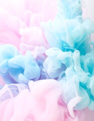 Fototapeta premium Soft pastel colors of blue and pink ink blending in water