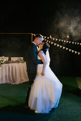 first dance of the bride and groom inside a restaurant