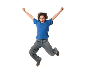 A boy wearing a blue t-shirt and grey jeans jumping for joy isolated on a transparent background