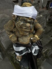 Detailed Stone Sculpture of a Balinese Temple Guardian