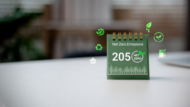 Green calendar showing Net Zero 2050 emissions target with eco icons, representing climate action, carbon neutrality, and environmental sustainability goals.