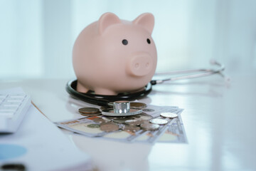 A doctor is performing a financial health check, using a stethoscope and a piggy bank to represent...
