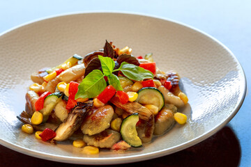 Colorful grilled vegetable medley with zucchini, bell peppers, corn & fresh basil. Healthy...