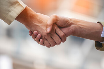 Trust honesty business customer handshake together promise respect partner. Businessman diversity...