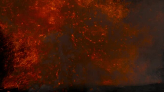 Massive fire storm explosion with embers and smoke, the fire engulfs the camera, alpha channel for transparent background, 30p