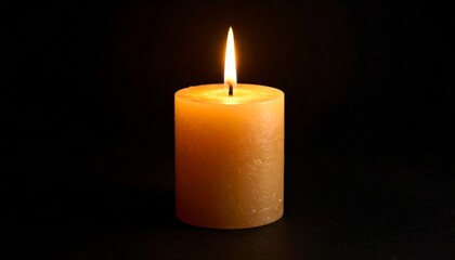 Burning candle on a black background 