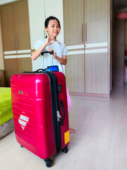 Adventure Awaits. A Little Girl's Anticipation is Palpable as She Eagerly Pulls a Large Suitcase, Ready to Set Off on a Fun-Filled Vacation with Her Family