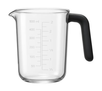 Measuring cup with a spout for easy pouring in a home kitchen.
