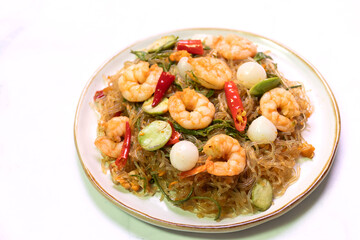 Stir fried stinky vegetables. Stir-fried shrimp noodles asian cuisine gourmet dish indoor setting close-up view flavorful experience.