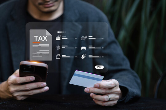 A man uses his smartphone and credit card to pay taxes online via a mobile application that breaks down the different tax types.