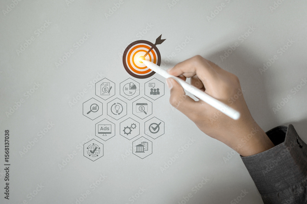Poster a hand uses a stylus to point at a target, with various business and marketing strategy icons linked