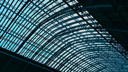 Modern steel arched roof structure with industrial and architectural symmetry