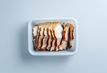 Boiled meat in a container