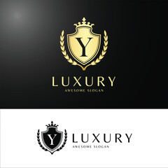 Luxury Crest Logo with Letter in Golden Shield and Laurel Design