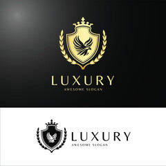 Luxury Eagle Crest Logo with Golden Shield, Crown, and Laurel Wreath