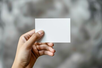 High Resolution of Hand Holding Business Card