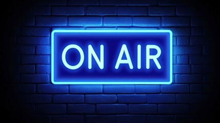 A glowing blue neon sign reading "ON AIR" mounted on a dark brick wall, indicating a live broadcast or recording in progress.