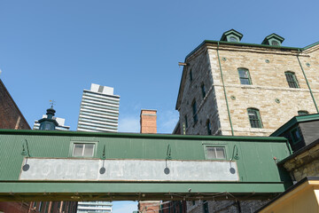 old, faded Gooderham & Worts sign at the Distillery Historic District, Toronto