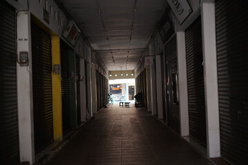 Mysterious Alleyway Exploring the Shadows of an Asian Market
