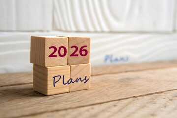 2026 plans in wooden blocks. Setting goal, target for next year. Plan and tasks. Financial management in company. Business and finance concept