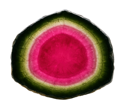 Watermelon tourmaline slice showing concentric rings of pink and green with radial symmetry