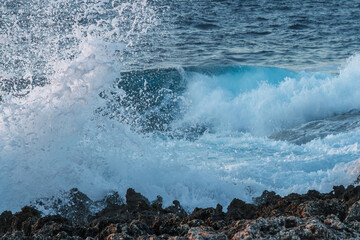waves crashing on rocks