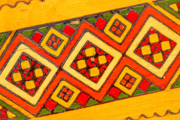 Rare wooden jewelry box, macro, top view.