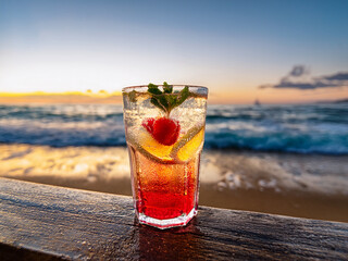 A vibrant collage of Italian soda drinks with fruit garnishes and ocean sunset backdrops