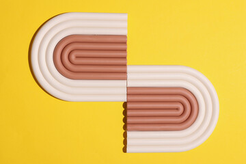 Geometric wavy lines platform stand on yellow background