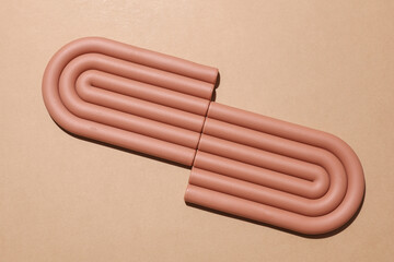 Geometric wavy lines platform stands on beige background. Top view
