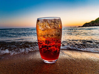 A sunset collage of Italian soda drinks with colorful layers and tropical fruit garnishes