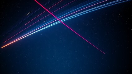 Double-exposure night sky with intersecting vibrant meteor trails, representing celestial events.