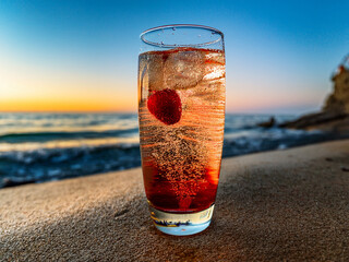 A beachside collage of Italian soda drinks with fruit garnishes and golden hour tones