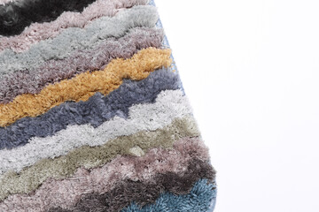 Multicolored shaggy rug texture close up
