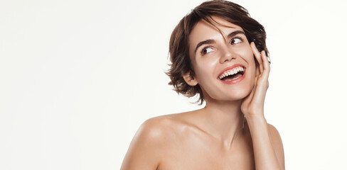 Close up portrait of candid smiling woman, beautiful natural smile, laughing and looking aside,...