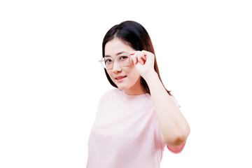 Asian young beautiful woman with long dark hair wearing a light pink shirt adjusts her clear...