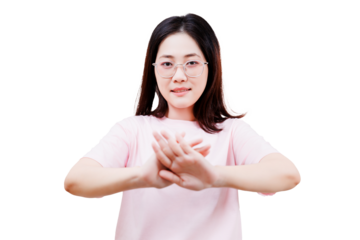 Asian young beautiful woman wearing glasses and a pink shirt is making a stop gesture with her hands crossed in front of her.