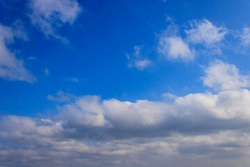 Beautiful Sky with Fluffy White Clouds, clear sky with natural lightning, blue color, summer background, cloud landscape.