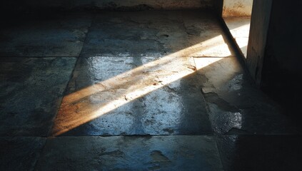 Sunlight streams onto a stone floor