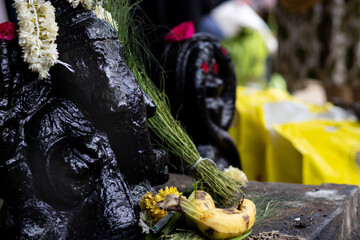 Ganesh idol or vinayagar with all pooja materials like flower, banana and green leaves