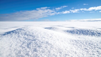 Snowy landscape under a vibrant blue sky
