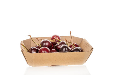 Sweet ripe cherry, macro, isolated on white background.