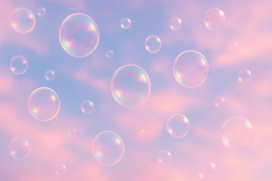 Whimsical pastel sky filled with floating transparent soap bubbles under pink and blue hues