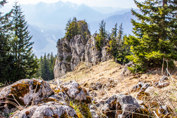 Landscape photo of an uphill climb in spring. Typical landscape in sunshine in the German Alps.